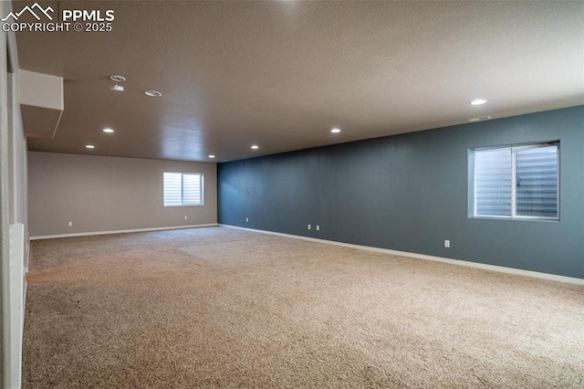 1985 Reed Grass Way, Colorado Springs, CO 80915 - carpeted spare room with recessed lighting, baseboards, and a textured ceiling