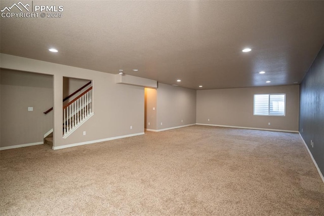 1985 Reed Grass Way, Colorado Springs, CO 80915 - empty room featuring carpet, recessed lighting, stairs, baseboards, and a textured ceiling