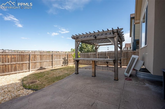 1985 Reed Grass Way, Colorado Springs, CO 80915 - fenced backyard featuring a pergola and a patio