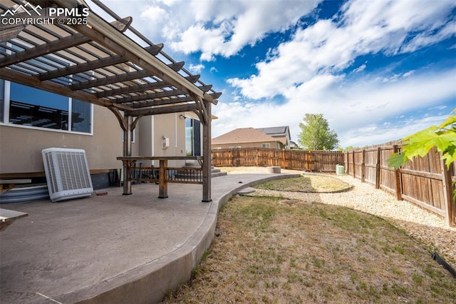 1985 Reed Grass Way, Colorado Springs, CO 80915 - fenced backyard featuring a patio and a pergola