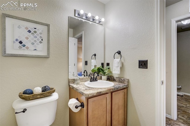 7923 Wagonwood Pl, Colorado Springs, CO 80908 - bathroom with vanity and toilet