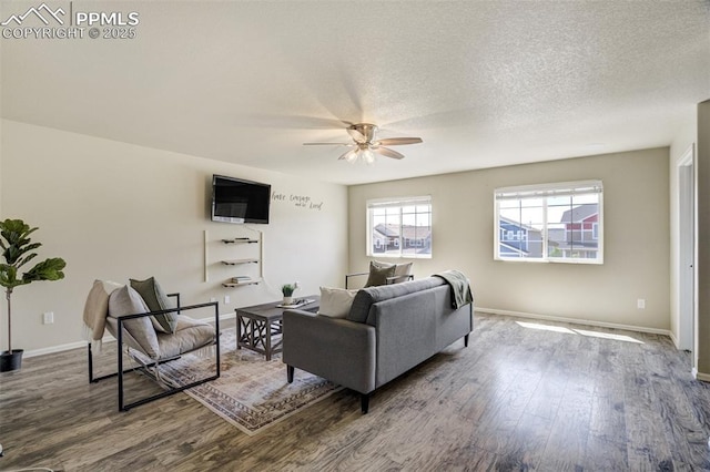 7923 Wagonwood Pl, Colorado Springs, CO 80908 - living room featuring a ceiling fan, wood finished floors, and baseboards
