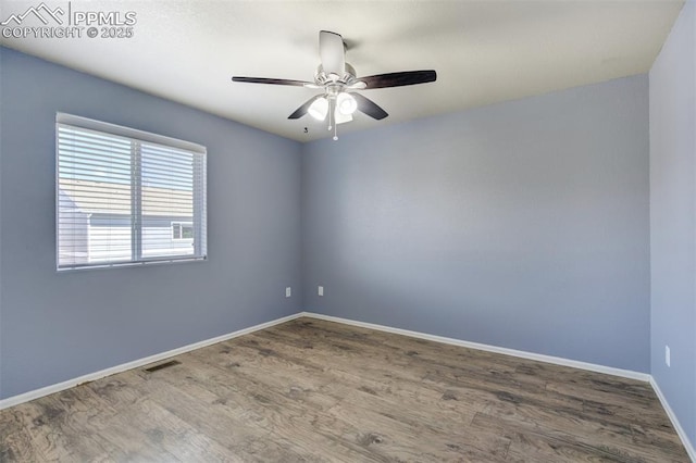 7923 Wagonwood Pl, Colorado Springs, CO 80908 - empty room featuring wood finished floors, baseboards, and a ceiling fan