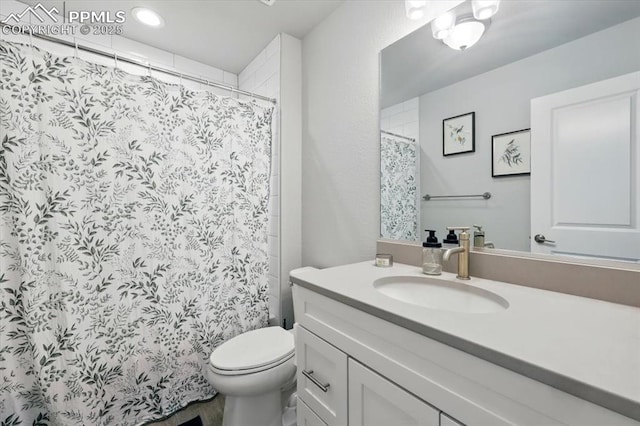 2454 Jazzy Lady Ct, Colorado Springs, CO 80922 - full bathroom with vanity, toilet, and curtained shower