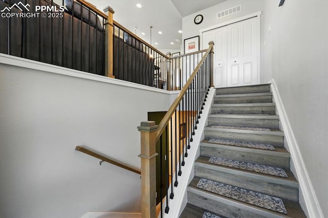2454 Jazzy Lady Ct, Colorado Springs, CO 80922 - stairway featuring baseboards, recessed lighting, and wood finished floors