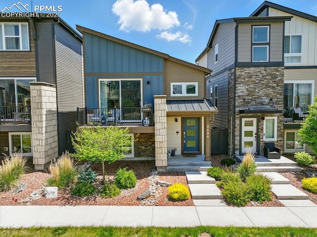 2454 Jazzy Lady Ct, Colorado Springs, CO 80922 - modern home with board and batten siding and stone siding