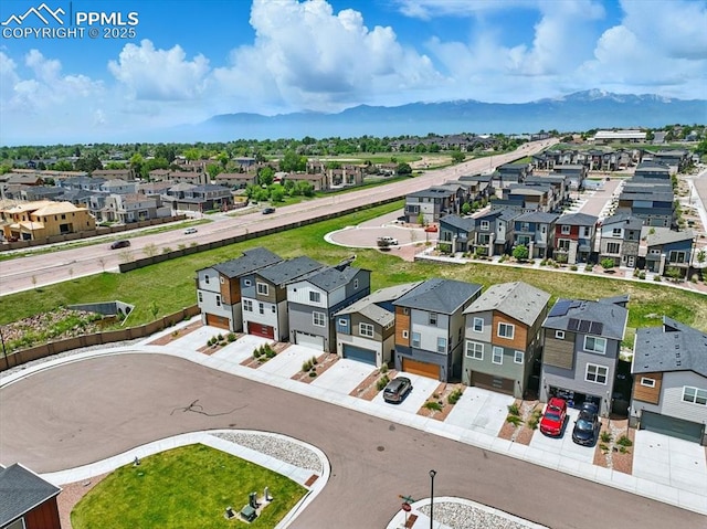 2454 Jazzy Lady Ct, Colorado Springs, CO 80922 - aerial perspective of suburban area featuring mountains