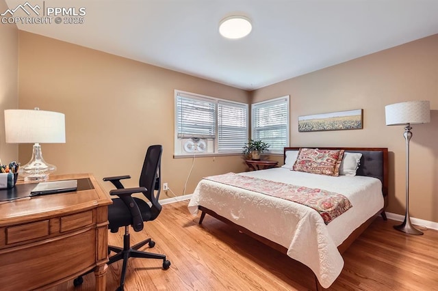 1609 Palmer Park Blvd, Colorado Springs, CO 80909 - bedroom featuring light wood finished floors, baseboards, and a desk
