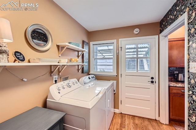1609 Palmer Park Blvd, Colorado Springs, CO 80909 - laundry room featuring independent washer and dryer and light wood-style flooring