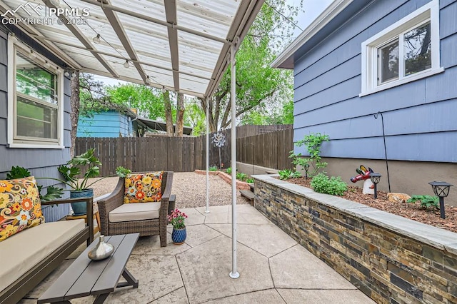 1609 Palmer Park Blvd, Colorado Springs, CO 80909 - fenced backyard featuring a patio area and a pergola