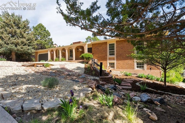490 Wintery Cir, Colorado Springs, CO 80919 - view of front facade featuring a garage