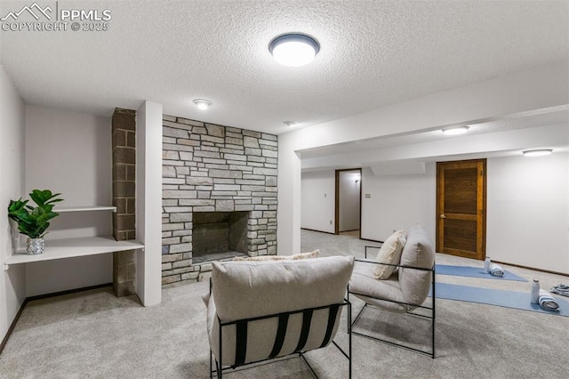 490 Wintery Cir, Colorado Springs, CO 80919 - living room with carpet, a textured ceiling, and a fireplace