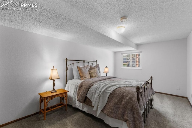 490 Wintery Cir, Colorado Springs, CO 80919 - bedroom with carpet flooring, baseboards, and a textured ceiling