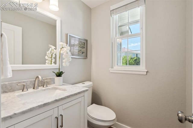 9969 Bridgeport Dr, Colorado Springs, CO 80920 - half bath with toilet and vanity