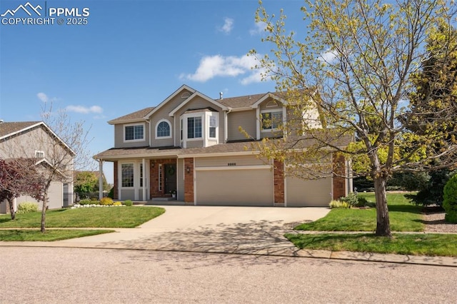9969 Bridgeport Dr, Colorado Springs, CO 80920 - traditional home featuring driveway, a garage, a front lawn, and brick siding
