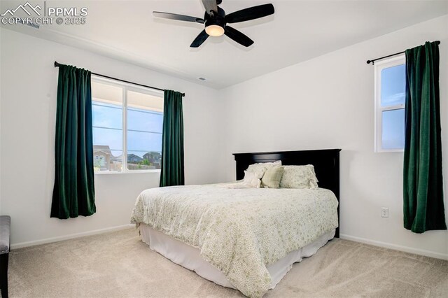 10046 Keating Dr, Peyton, CO 80831 - carpeted bedroom with baseboards and ceiling fan