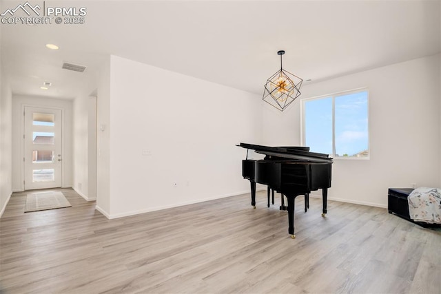 10046 Keating Dr, Peyton, CO 80831 - living area with light wood-style flooring and baseboards