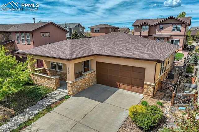 6720 Hidden Hickory Cir, Colorado Springs, CO 80927 - view of front facade featuring stone siding, a garage, roof with shingles, a residential view, and stucco siding