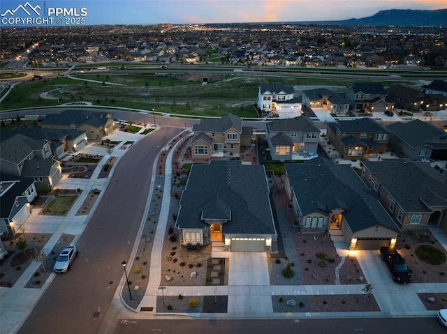 5799 Adkisson Pl, Colorado Springs, CO 80924 - aerial view of property and surrounding area with nearby suburban area and mountains