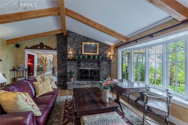 24 Upland Rd, Colorado Springs, CO 80906 - living room with wood finished floors and a stone fireplace