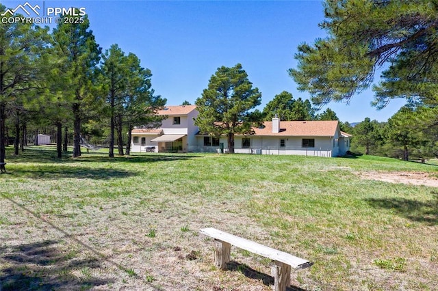 390 E Stirrup Trl, Monument, CO 80132 - view of green lawn