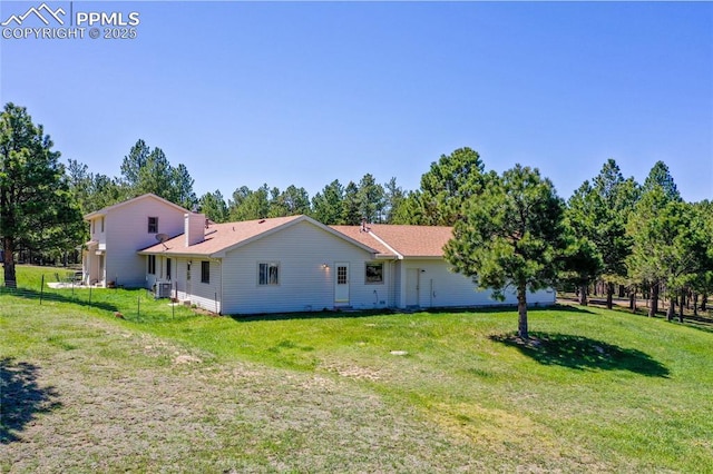 390 E Stirrup Trl, Monument, CO 80132 - rear view of house with central AC