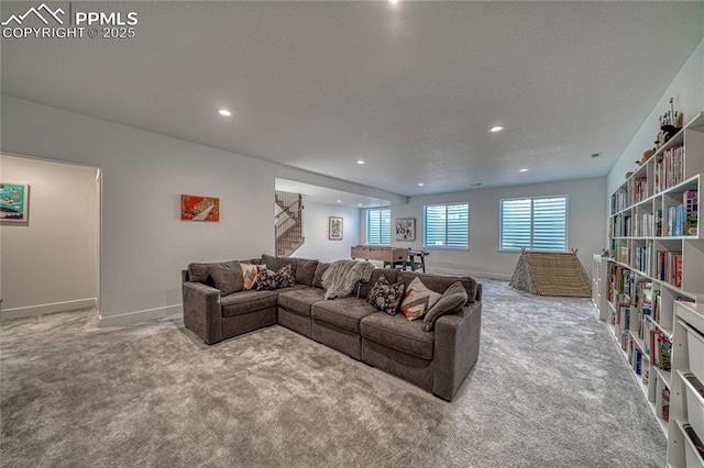 9473 Bugaboo Dr, Colorado Springs, CO 80924 - carpeted living room with recessed lighting, baseboards, and a textured ceiling