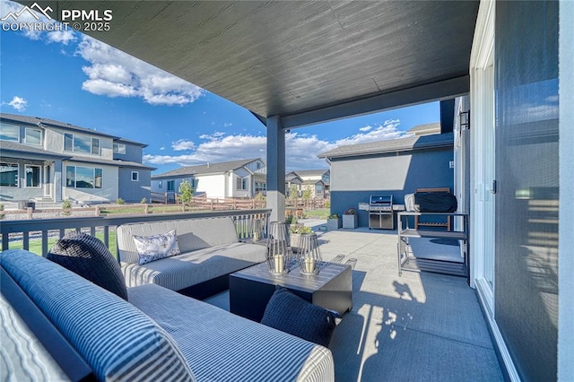 9473 Bugaboo Dr, Colorado Springs, CO 80924 - balcony featuring an outdoor living space, a residential view, and grilling area