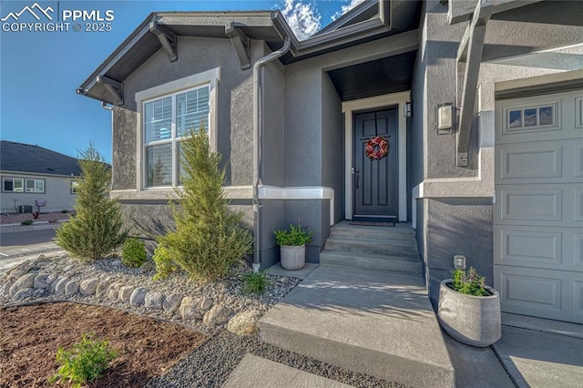 9473 Bugaboo Dr, Colorado Springs, CO 80924 - doorway to property featuring stucco siding