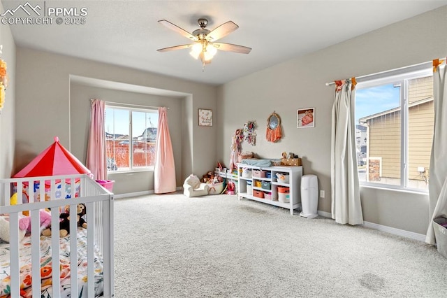 12879 Morning Creek Ln, Peyton, CO 80831 - bedroom with carpet floors, baseboards, and ceiling fan