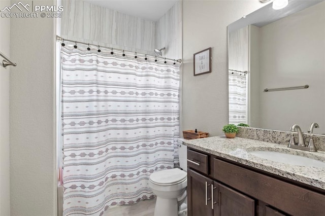 12879 Morning Creek Ln, Peyton, CO 80831 - bathroom with toilet, vanity, and curtained shower