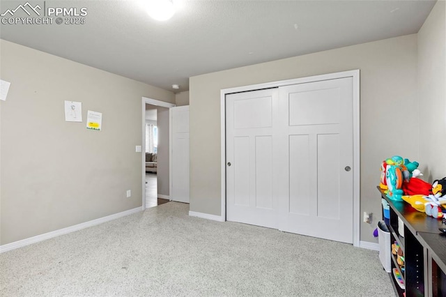 12879 Morning Creek Ln, Peyton, CO 80831 - bedroom with baseboards and a closet