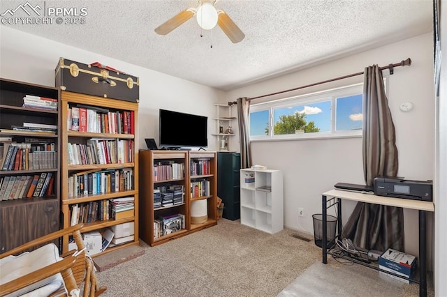 1409 Evergreen Dr, Colorado Springs, CO 80911 - sitting room with a textured ceiling, a ceiling fan, and carpet flooring