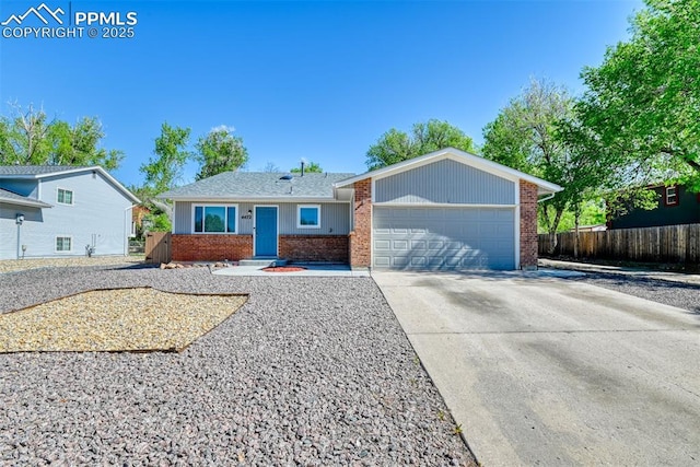 4472 Eastcrest Cir, Colorado Springs, CO 80916 - single story home featuring brick siding, a garage, and concrete driveway