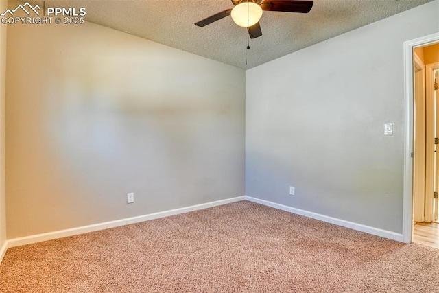 4472 Eastcrest Cir, Colorado Springs, CO 80916 - spare room featuring carpet flooring, ceiling fan, a textured ceiling, baseboards, and vaulted ceiling