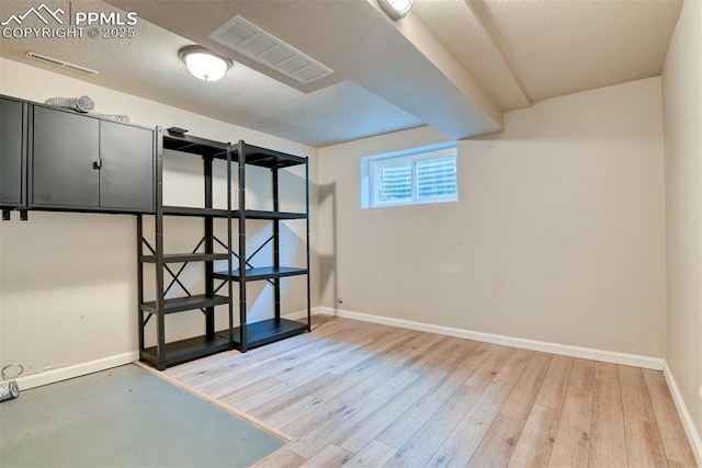 4472 Eastcrest Cir, Colorado Springs, CO 80916 - basement featuring baseboards and wood finished floors