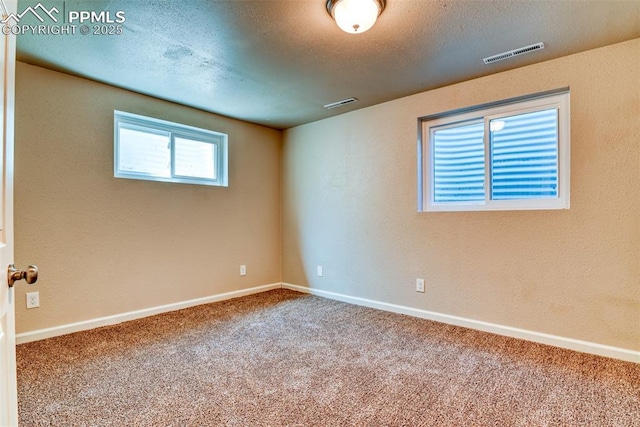 4472 Eastcrest Cir, Colorado Springs, CO 80916 - carpeted empty room featuring baseboards and a textured ceiling