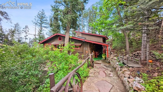 3875 Overlook Rd, Colorado Springs, CO 80906 - back of property featuring a chimney