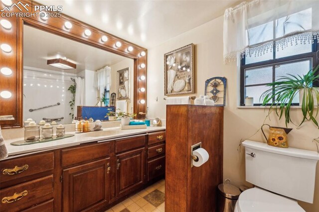 3875 Overlook Rd, Colorado Springs, CO 80906 - bathroom with vanity and a shower with shower curtain