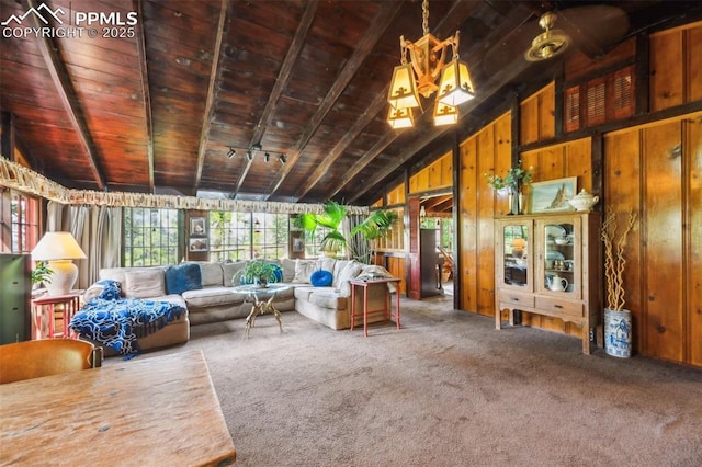 3875 Overlook Rd, Colorado Springs, CO 80906 - carpeted living area featuring wood walls and wood ceiling