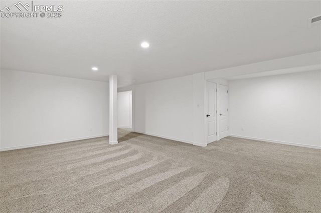 4430 Songglen Cir, Colorado Springs, CO 80906 - finished basement featuring carpet flooring, recessed lighting, and baseboards
