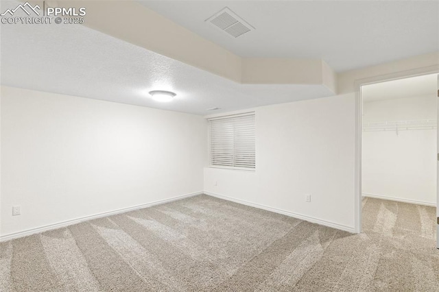 4430 Songglen Cir, Colorado Springs, CO 80906 - unfurnished bedroom with carpet floors, a spacious closet, baseboards, and a closet