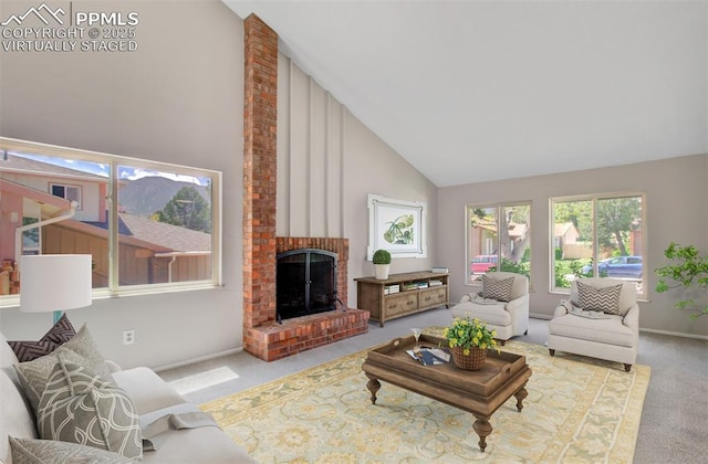 3177 Blue Mountain Way, Colorado Springs, CO 80906 - carpeted living area with high vaulted ceiling, a fireplace, and baseboards
