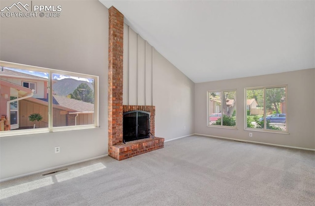 3177 Blue Mountain Way, Colorado Springs, CO 80906 - unfurnished living room featuring high vaulted ceiling, carpet flooring, a fireplace, and baseboards