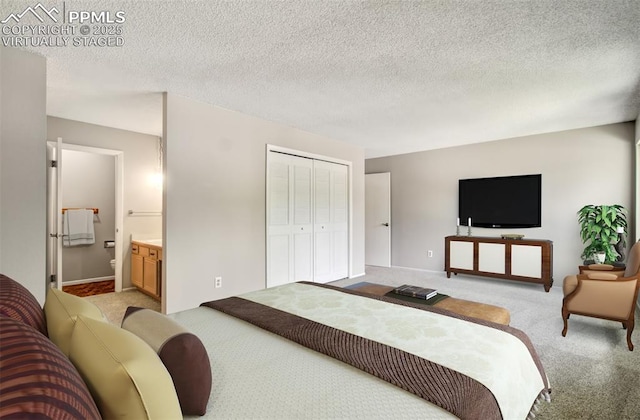 3177 Blue Mountain Way, Colorado Springs, CO 80906 - bedroom featuring light colored carpet, a closet, connected bathroom, baseboards, and a textured ceiling