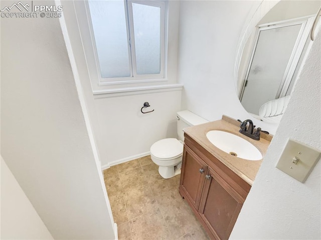 8193 Horizon Dr, Colorado Springs, CO 80920 - full bath with an enclosed shower, vanity, and toilet