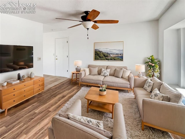 8193 Horizon Dr, Colorado Springs, CO 80920 - living area featuring wood finished floors and ceiling fan