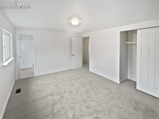 5570 Whimsical Dr, Colorado Springs, CO 80917 - unfurnished bedroom with carpet floors, baseboards, and a closet