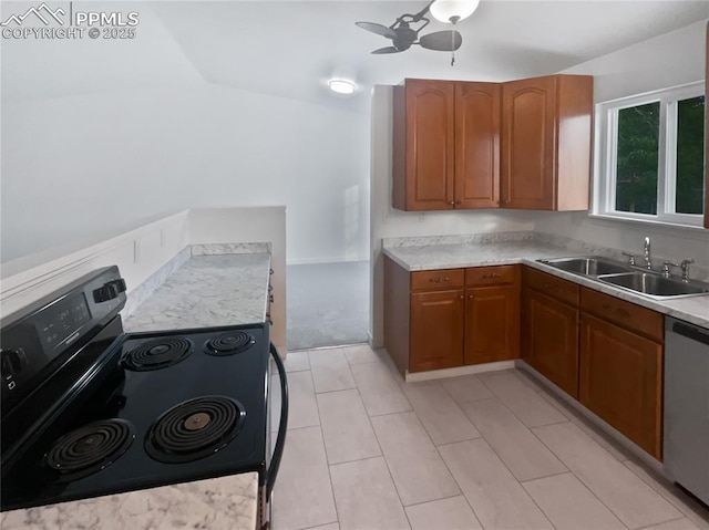 5570 Whimsical Dr, Colorado Springs, CO 80917 - kitchen with stainless steel appliances, a sink, brown cabinets, light countertops, and ceiling fan