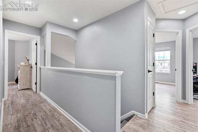 14213 Woodrock Path, Colorado Springs, CO 80921 - hall featuring an upstairs landing, wood finished floors, baseboards, and recessed lighting